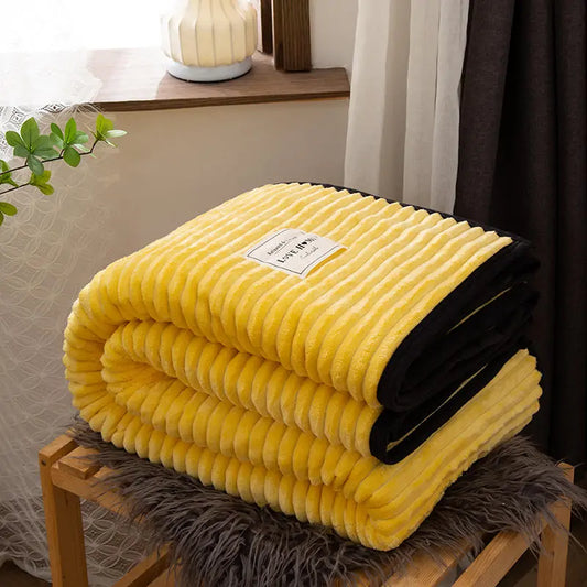 Yellow throw with black edging